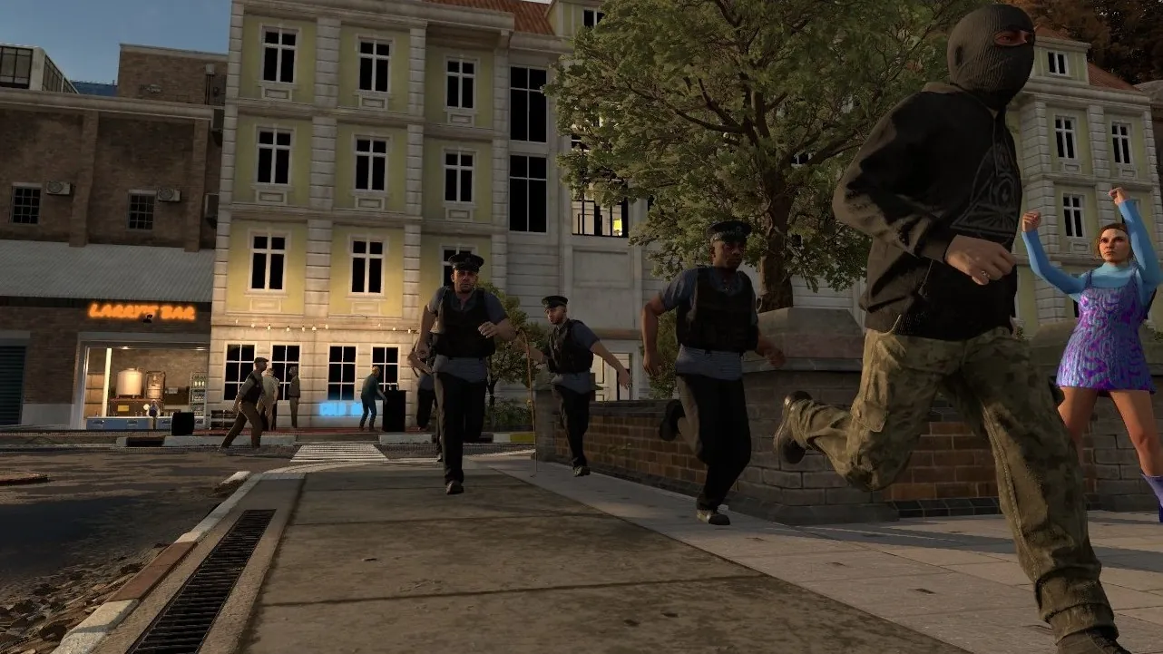 A masked thief sprints across the town square with three police officers right behind him