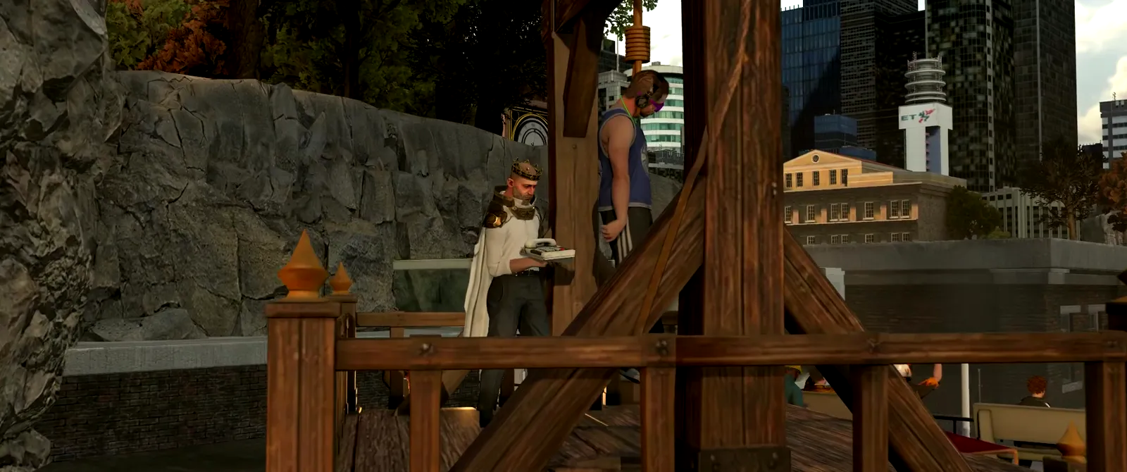 A man waits on the gallows in the town square while a priest reads beside him